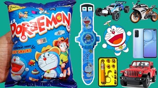 Doraemon snacks 😍 main mujhe mile Two doraemon eraser 🤩pen 🥰 binocular 😍 or bhot aache aache gifts