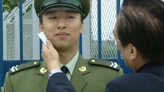 Chinese soldiers stood guard in Hong Kong for the first time. An old man wiped the sweat off the sol