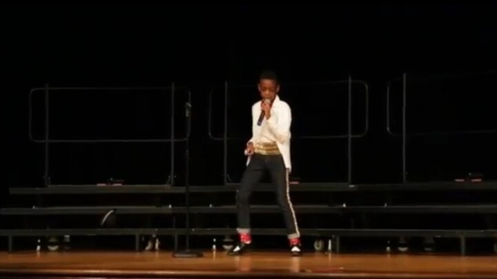 A little black boy actually sang and danced to Billie Jean. What a racial talent!