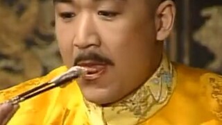 皇上发现刘墉骗他吃假芋头，要治他罪，刘墉却端起整盘肉吃得老香