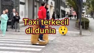 naik taksi ini harus sambil berdiri