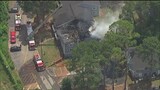 Fire crews work to put out apartment fire in DeKalb County
