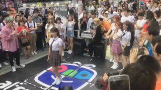 Dancing on the Street by a Girl in JK Skirt