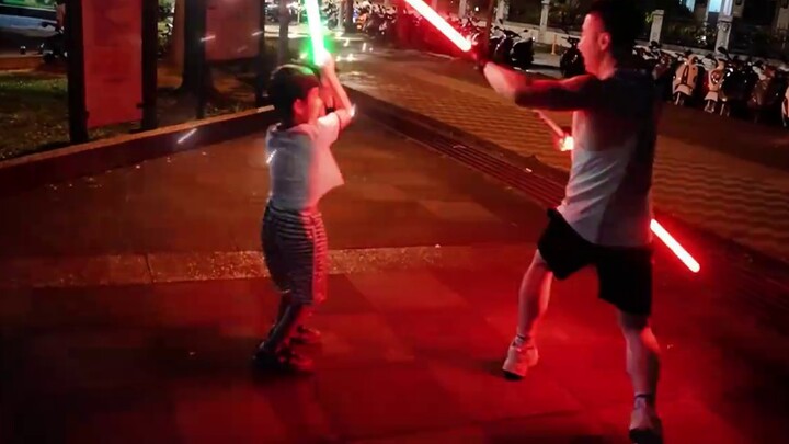 Upgrade your moves! Dad will still chop! Lightsaber duel between father and son