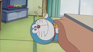 Doraemon ikat kepala anak angin