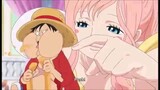 One piece- princess Shirahoshi pushes Luffy's cheek