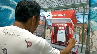 PERTASHOP, MELUKIS TEMPAT MENGISI BENSIN (TANJUNGSARI BOGOR) KARYA DANDAN SA