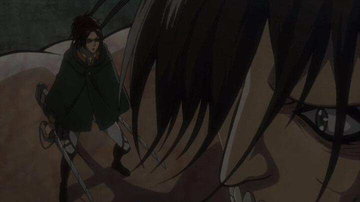 Hanji stood on Eren's shoulders