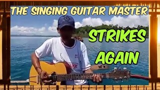 THE SINGING GUITAR MASTER STRIKES AGAIN