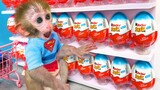 Monkey Baby Bon Bon goes to the toilet and doing shopping in Kinder Joy eggs store