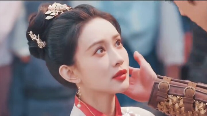Who said that the classic sliding and kneeling hug has become the director's anti-counterfeiting mar