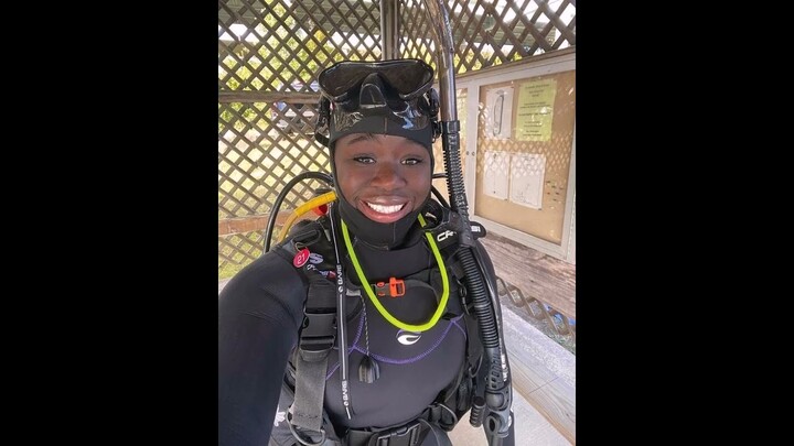 African girls in latex full face gas masks and scuba diving gear dresses