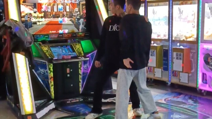 I saw two guys doing Trouble Maker in the arcade.