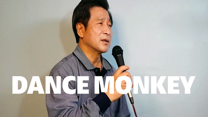 A Middle-Age Man Sings Dance Money
