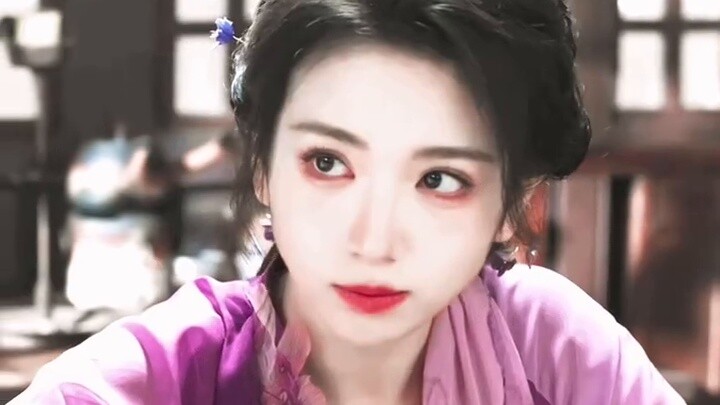 The look in her eyes is really different! There is a hint of tenderness and gentleness between her e