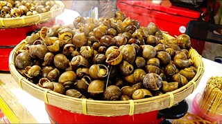 Thai street food Liab duan night market Bangkok , snail, rainbow cheese, oyster, taiyaki