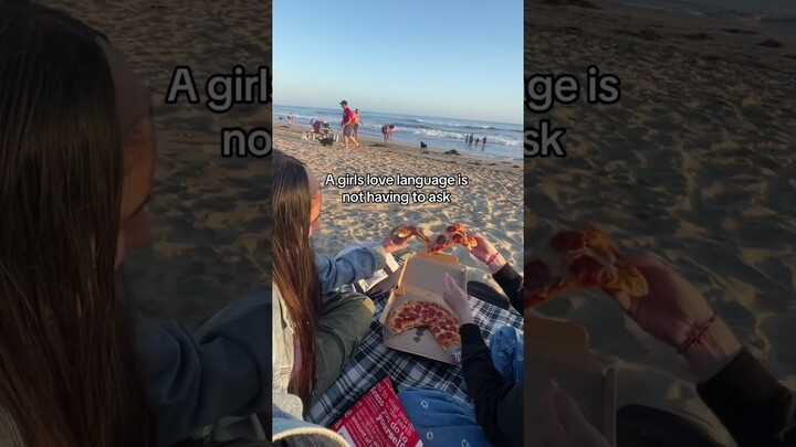A girls love language pizza on the beach date ? #shorts #girls #couple