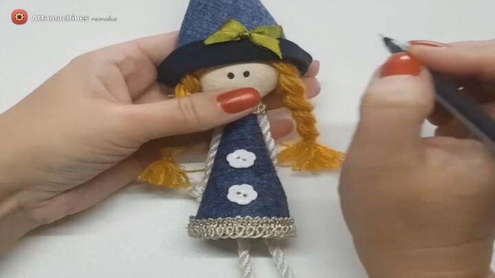 Doll in a hat made from leftover jeans