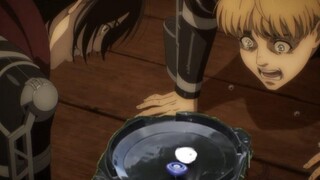 Mikasa and Armin playing with spinning tops on the airship