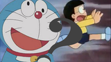 Tiga kalimat! Saya baru saja meminta Doraemon untuk mengeluarkan 18 bom nuklir... Hei, itu bukan bom
