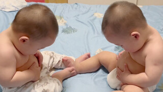 It’s so funny, the twin babies finally discovered their beer bellies!