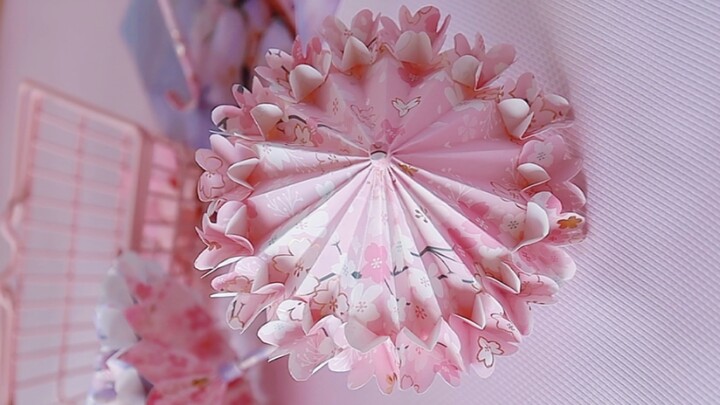 I have folded the most beautiful free retractable cherry blossom umbrella. God, this is too beautifu