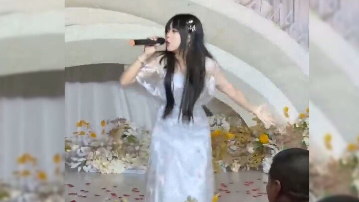 Too She is dead! She was pushed onto the stage to sing at a wedding, and it instantly turned into a 