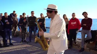 This overbearing charm! Italian saxophone street performance playing "Believer"