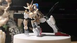The up master spelled out Barbatos with ice cream sticks and discarded Gundam corpses
