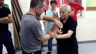 The eldest son of the patriarch Ip Man, Ip Chun, fighting foreigners