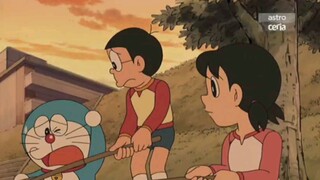 papa nobita dan ikan di sungai