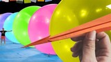 Karet gelang yang dapat menembus balon melontarkan pesawat kertas, sederhana dan mendominasi