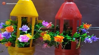 Recycle plastic bottles into hanging flower pots