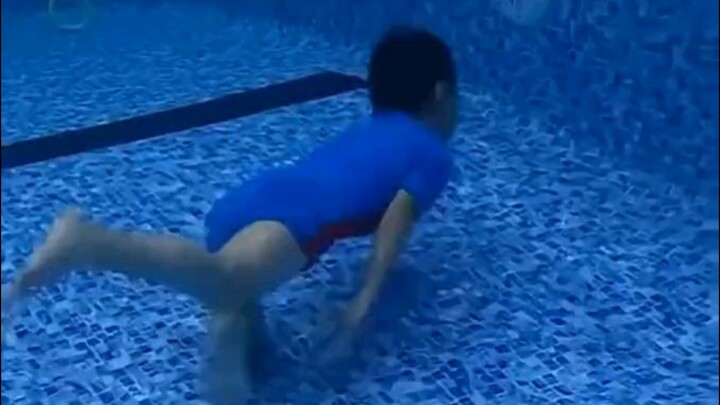 Are people really born knowing how to swim? What's the point of tying up children?