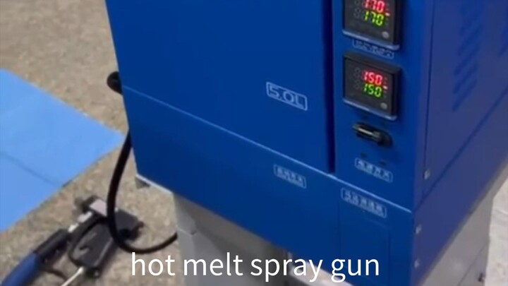 Hot melt spray gun .