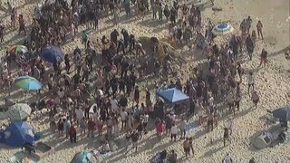 San Diego lifeguards rescue girl trapped under sand at Mission Beach