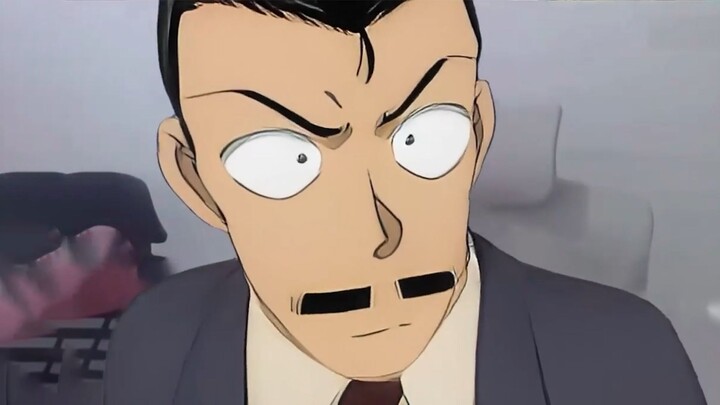 Kogoro Mouri: Tôi là mặt dây chuyền à? Trả lời tôi đi! nhìn vào mắt tôi!