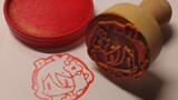 Make a cocoa signature stamp, the little red flower that mom gave you
