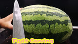Carving a Lafite 82 in the watermelon
