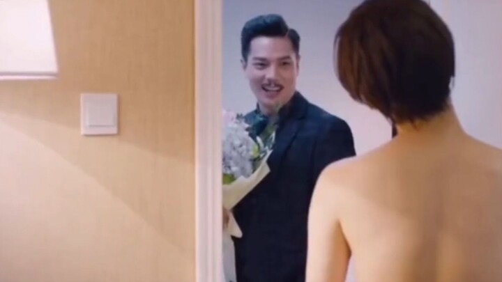 The female man opened the door after taking a shower. Unexpectedly, the bath towel covered her lower