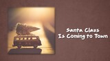 Mariah Carey - Santa Claus Is Coming To Town ( Lyrics )