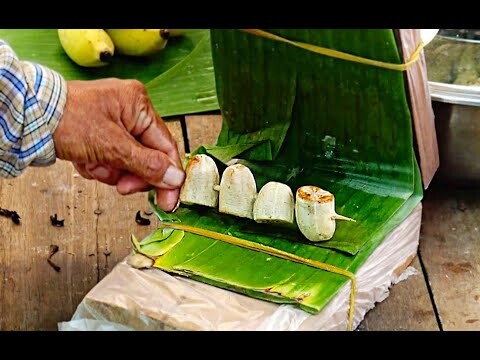 grilled banana with coconut sauce , guayjub at floating market