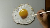 Menggambar telur goreng untuk menghilangkan rasa lapar
