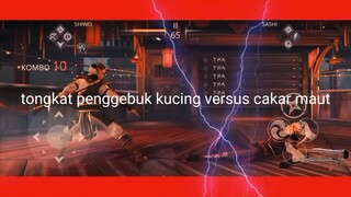 tongkat penggebuk kucing versus cakar maut