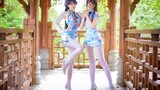 สองสาวแต่งชุดกี่เพ้าถุงน่องสีขาวมาเต้นในเพลง Tao Hua Xiao  
