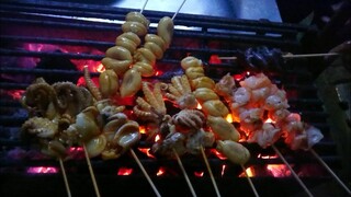 Thailand street food ไข่ปลาหมึกย่าง สด น้ำจิ้มต้องเผ็ด พริกชัดๆ แซ่บ Grilled  BBQ squid