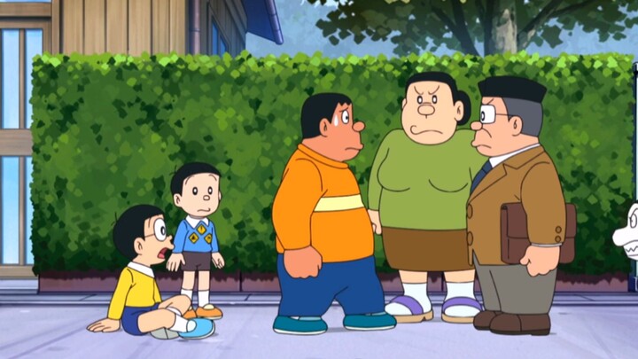 Nobita dùng miếng dán biển báo giao thông để chơi với Hổ Béo