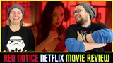 RED NOTICE Netflix Movie Review  (New Ryan Reynolds, Gal Gadot and Dwayne Johnson Film)