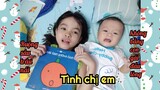 Chị hai đọc truyện cho em bé nghe trước khi đi ngủ