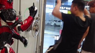 Street Prank 01: A large steel Deadpool figurine appears in the parking lot